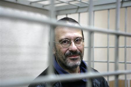 Greenpeace International activist Dimitri Litvinov, one of the "Arctic 30" detained on piracy charges, attends his bail hearing at the Regional Court of Murmansk October 23, 2013. REUTERS/Igor Podgorny/Greenpeace/Handout via Reuters