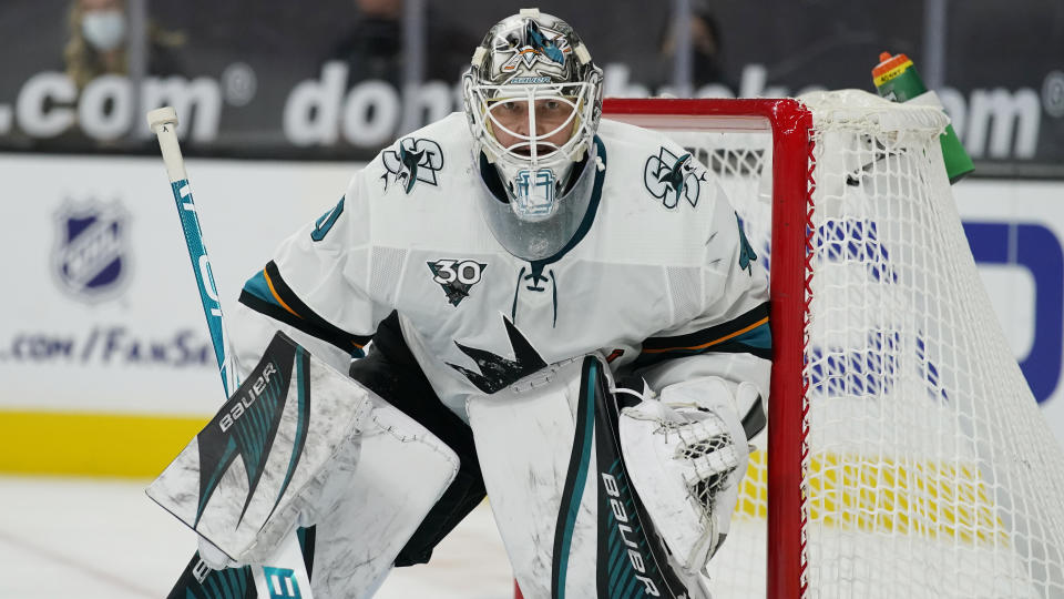 FILE - In this March 15, 2021, file photo, San Jose Sharks goaltender Devan Dubnyk (40) guards the net during an NHL hockey game against the Vegas Golden Knights in Las Vegas. The Colorado Avalanche acquired goaltender Devan Dubynk from the San Jose Sharks on Saturday, April 10, 2021, in exchange for defenseman Greg Pateryn and a fifth-round pick in the 2021 draft. (AP Photo/John Locher, File)