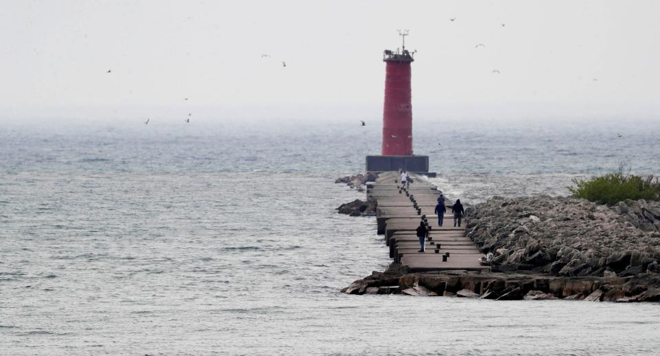 A view of the Sheboygan lighthouse as seen, Tuesday, May 31, 2022, in Sheboygan, Wis. A search for a man who was last seen near a break wall on Lake Michigan will continue today, according to the Sheboygan Fire Department
