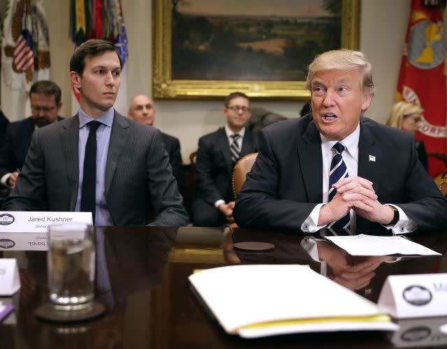 WASHINGTON, DC – JANUARY 31: U.S. President Donald Trump (R) delivers remarks at the beginning of a meeting with his son-in-law and Senior Advisor Jared Kushner and government cyber security experts in the Roosevelt Room at the White House January 31, 2017 in Washington, DC. Citing the hack of computers at the Democratic National Committee by Russia, Trump said that the private and public sectors must do more to prevent and protect against cyber attacks. (Photo by Chip Somodevilla/Getty Images)