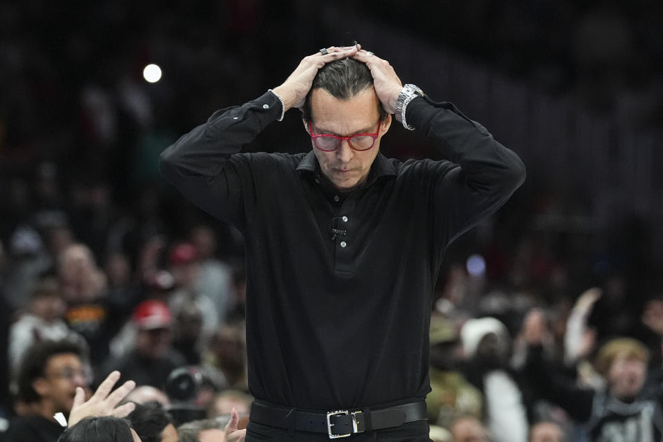 Atlanta Hawks hhead coach Quin Snyder reacts on the sideline during the second half of an NBA basketball game against the San Antonio Spurs Monday, Jan. 15, 2024, in Atlanta. (AP Photo/John Bazemore)