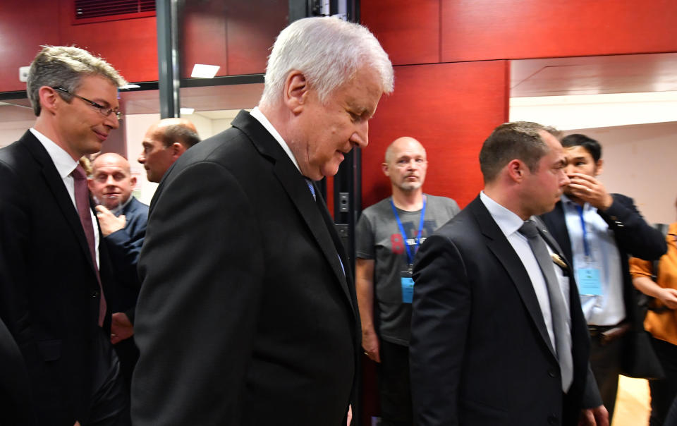 Horst Seehofer, German Interior Minister and Chairman of the Christian Social Union, CSU, arrives for a statement in the state parliament in Munich, Germany, Sunday, Oct. 14, 2018, after his party lost in he Bavarian state election. (AP Photo/Kerstin Joensson)