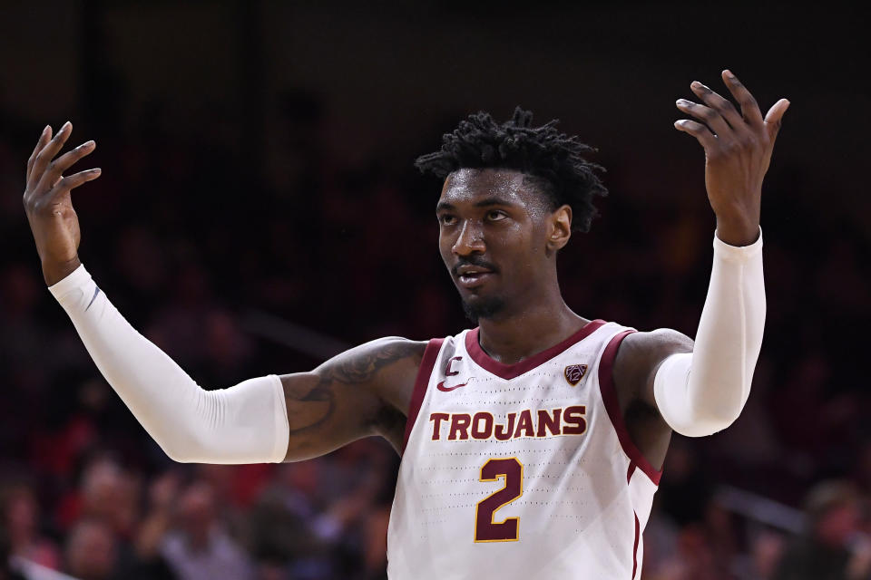 Southern California guard Jonah Mathews celebrates after scoring during the second half of an NCAA college basketball game against Washington, Thursday, Feb. 13, 2020, in Los Angeles. (AP Photo/Mark J. Terrill)