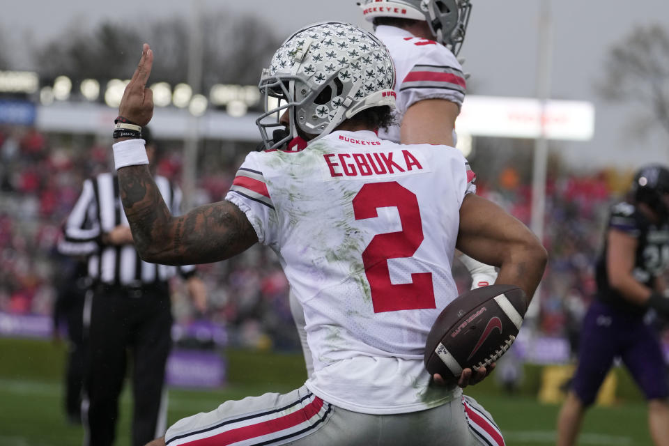 Ohio State wide receiver Emeka Egbuka reacts after scoring a touchdown against Northwestern during the first half of an NCAA college football game, Saturday, Nov. 5, 2022, in Evanston, Ill. (AP Photo/Nam Y. Huh)