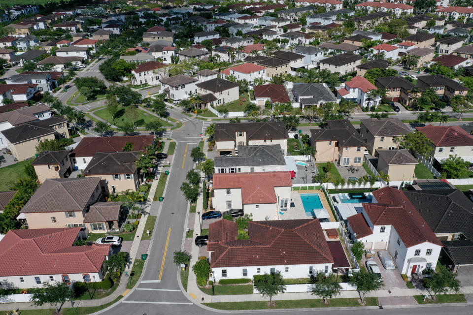 MIAMI, FLORIDA - MAY 10:  In an aerial view, single family homes are shown in a residential neighborhood on May 10, 2022 in Miami, Florida. New published data has hinted at improvement in the supply of homes for sale as April's numbers show inventory down 12 percent from the same month last year, the smallests yearly decline since the end of 2019.  (Photo by Joe Raedle/Getty Images)