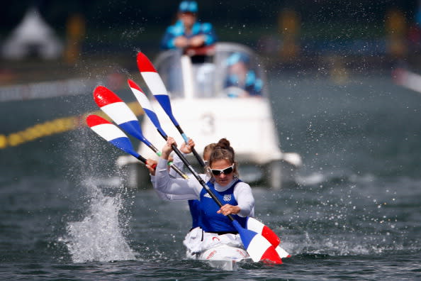 WINDSOR, ENGLAND - AUGUST 06: Gabrielle Tuleu of France and her team compete in the Women's Kayak Four (K4) 500m Sprint semifinal on Day 10 of the London 2012 Olympic Games at Eton Dorney on August 6, 2012 in Windsor, England. (Photo by Jamie Squire/Getty Images)