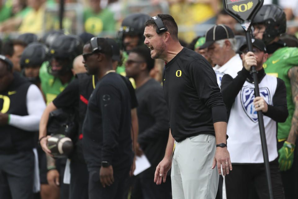 Oregon head coach Dan Lanning calls out to players during the first half of an NCAA football game against Colorado, Saturday, Sept. 23, 2023, in Eugene, Ore. (AP Photo/Amanda Loman)