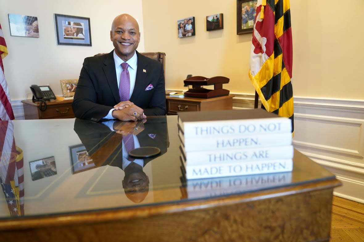 Maryland Gov. Wes Moore poses for a photo in his office at the Statehouse in Annapolis, Md., Thursday, March 16, 2023. (AP Photo/Susan Walsh)