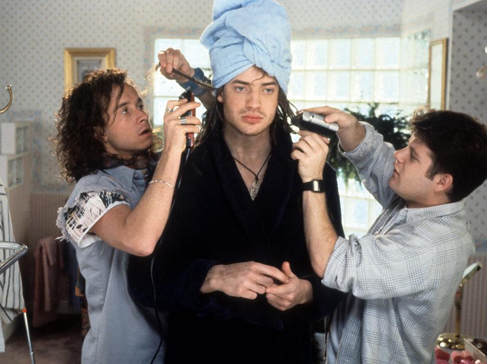 Pauly Shore and Sean Astin trim Brendan Fraser's hair in this scene from "Encino Man."