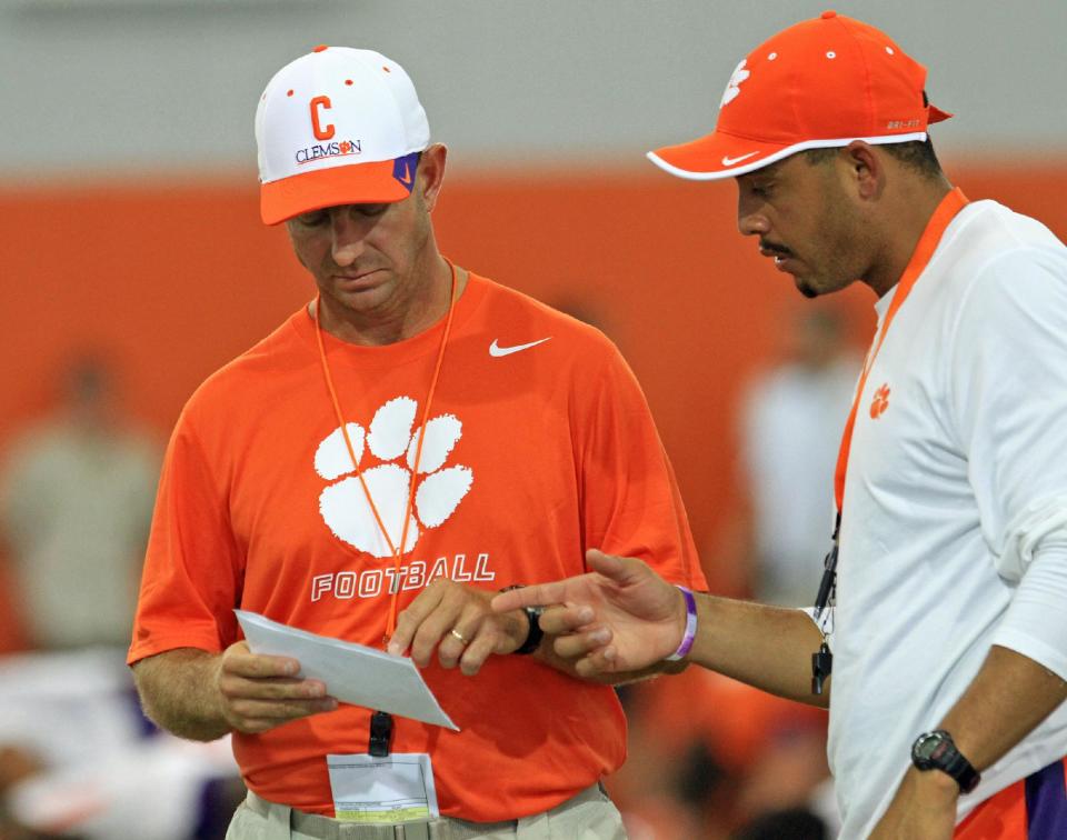 Clemson’s Dabo Swinney knows too well how capable assistant Tony Elliott is as a coach. (AP file photo)