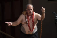 Aupito William Sio, New Zealand's Minister for Pacific Peoples, speaks during a ceremony in Auckland, Sunday, Aug. 1, 2021, to formally apologize for a racially charged part of the nation's history known as the Dawn Raids. The Dawn Raids are known as the time when the Pasifika people were targeted for deportation in the mid-1970s during aggressive home raids by authorities to find, convict and deport visa overstayers. (Brett Phibbs/New Zealand Herald via AP)