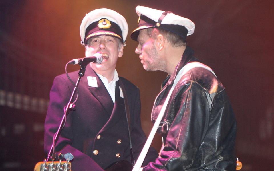 Mick Jones (L) and Paul Simonon with Gorillaz on the Pyramid Stage in 2010 - Dave Hogan/Getty Images