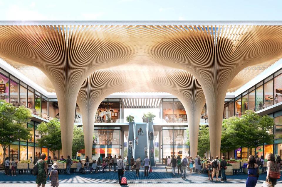 An artist’s rendering depicts the interior of a high-speed rail station in California’s Central Valley with spacious areas including retail and restaurant areas for passengers and visitors.