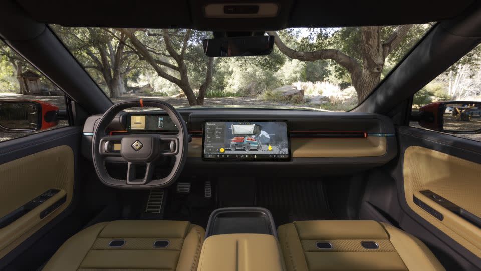 The Rivian R3X features a sportier interior and exterior. - Rivian