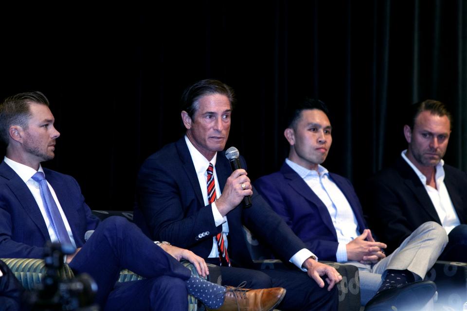 Greg Wallis, left, Nathan Hochman, Lanhee Chen and Ian Weeks participate in a primary candidate forum hosted by The Lincoln Club of the Coachella Valley in Rancho Mirage, Calif., on May 9, 2022.