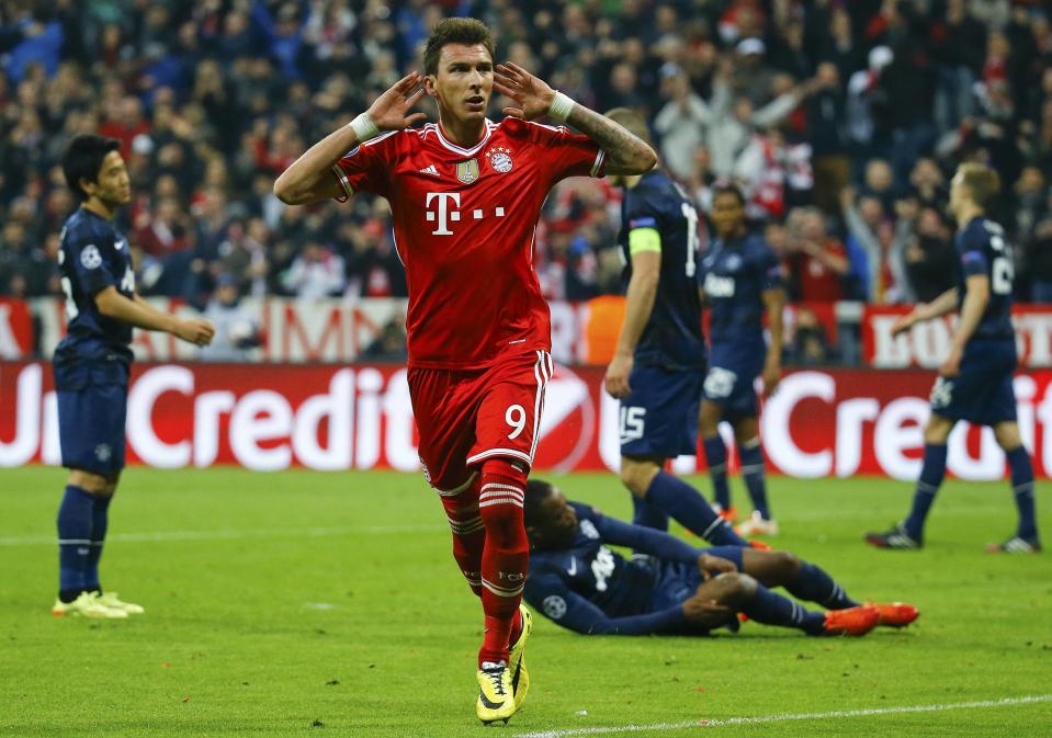 Bayern Munich's Mario Mandzukic celebrates after scoring a goal against Manchester United during their Champions League quarter-final second leg soccer match in Munich, April 9, 2014. REUTERS/Kai Pfaffenbach (GERMANY - Tags: SPORT SOCCER)