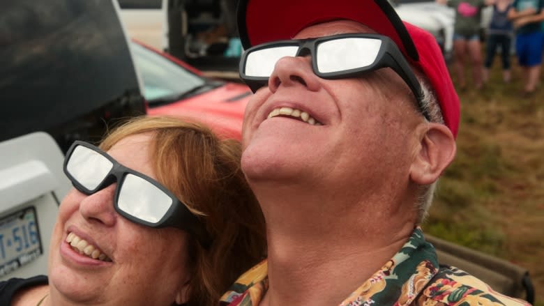 Rain, clouds don't dampen eclipse excitement in Missouri