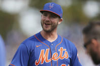 FILE - In this Feb. 22, 2020, file photo, New York Mets' Pete Alonso is shown before a spring training baseball game against the Miami Marlins in Port St. Lucie, Fla. Video games have become a go-to hobby for millions self-isolating around the world, and athletes from preps to pros have eagerly grabbed the controls. It's been a seamless transition for Minnesota Twins pitcher Trevor May, who is also a pro video game streamer. May says he's been helping other athletes, including New York Mets slugger Pete Alonso, try to set up their own feeds. (AP Photo/Vera Nieuwenhuis, File)