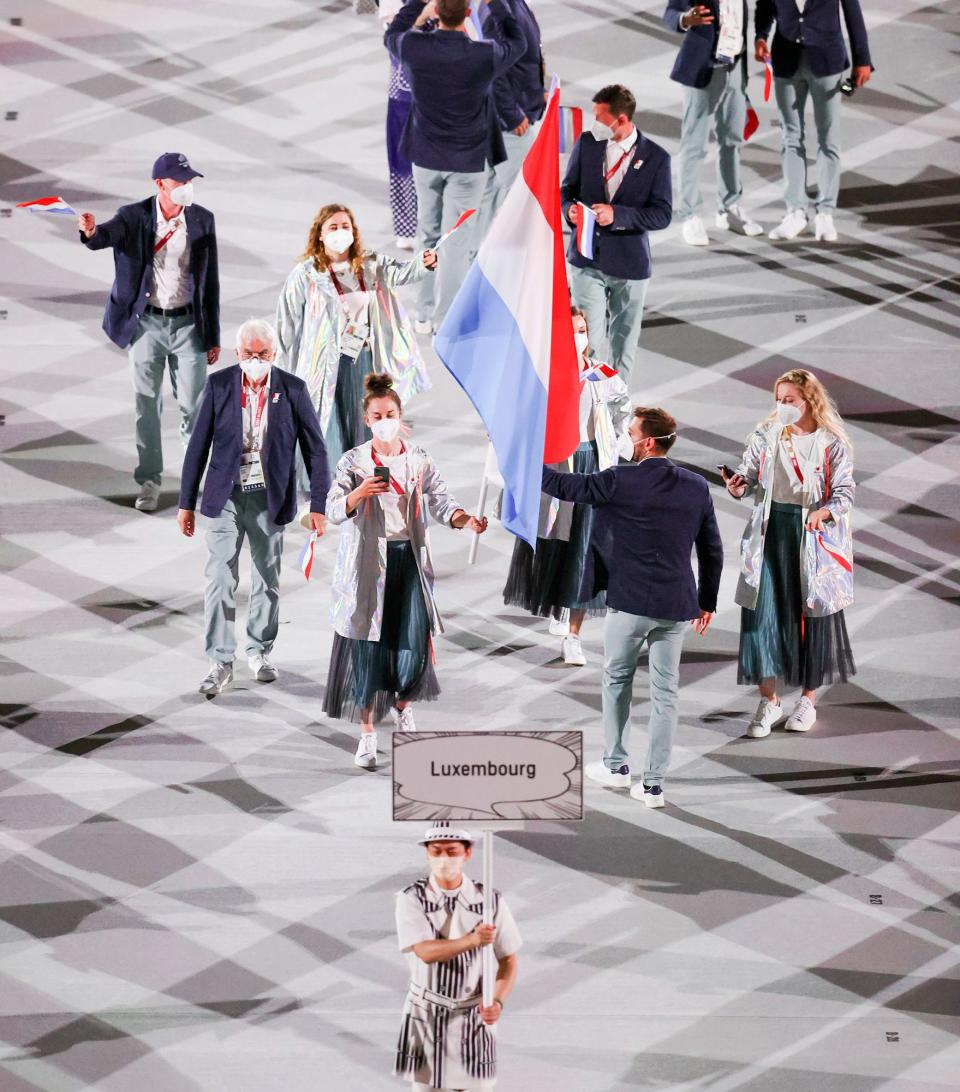 <p>Luxembourg rocked metallic jackets over their uniforms. </p>