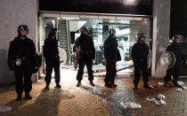 Riot police gathered to break up any violence in what was seen as 'copycat' attacks similar to those seen in London.