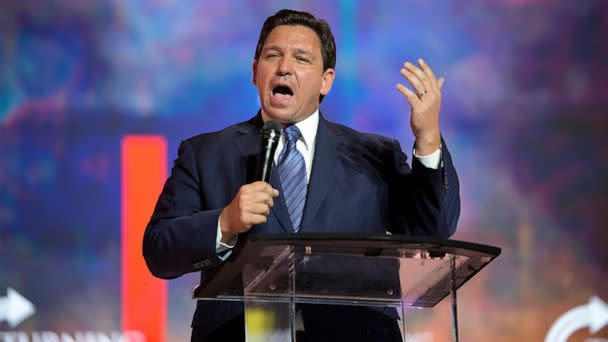 PHOTO: Florida Gov. Ron DeSantis addresses attendees during the Turning Point USA Student Action Summit, on July 22, 2022, in Tampa, Fla. (Phelan M. Ebenhack/AP)