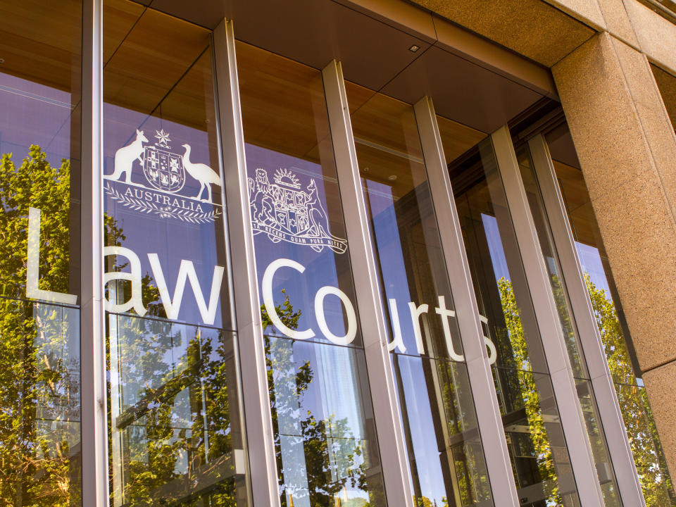 Sydney, Australia - October 26, 2013: The Front window of the Law Courts in Australia, with the coat of arms of Australia.