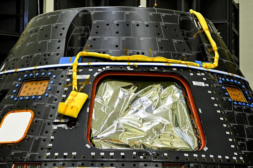 The Artemis II Crew Module is seen inside the Neil Armstrong Operations and Checkout Building at the Kennedy Space Center in Cape Canaveral, Florida.