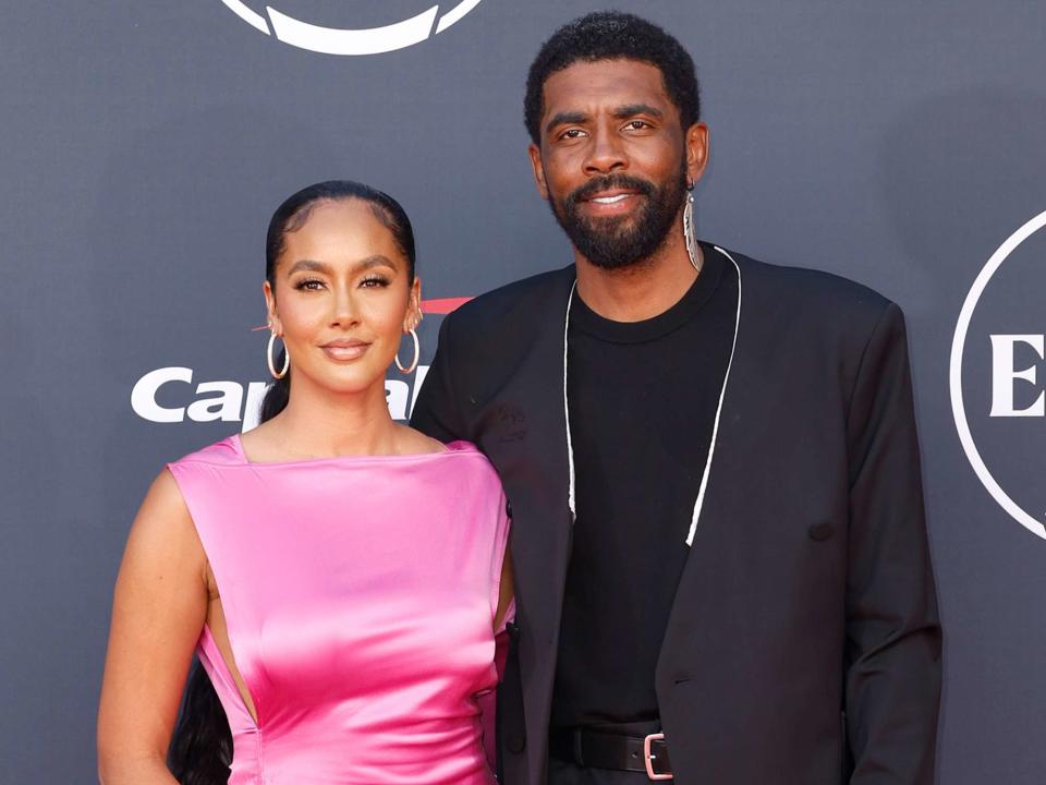 <p>Frazer Harrison/Getty</p> Marlene Wilkerson and Kyrie Irving attend The 2023 ESPY Awards.