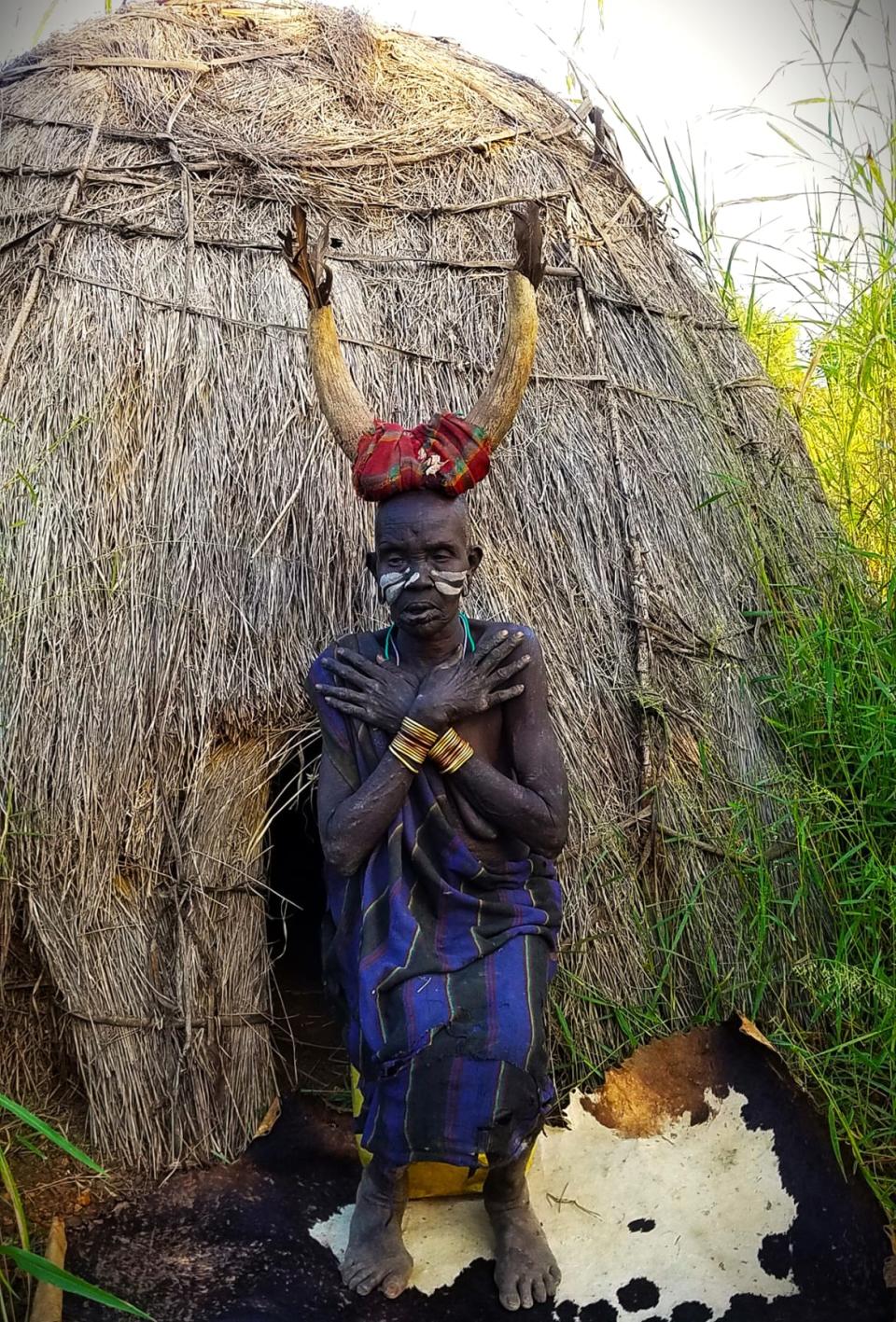 <div class="inline-image__caption"><p>A Mursi elder dresses in exotic garb and poses for a photographer.</p></div> <div class="inline-image__credit">Jody Ray</div>