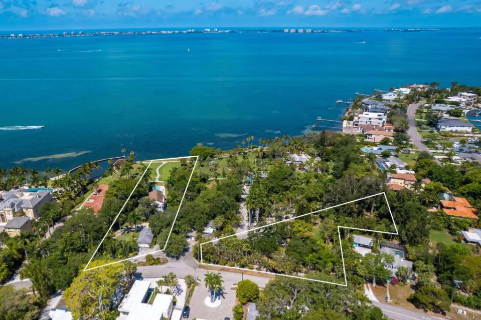 An aerial shot of the two properties that can be purchased together. Coastal Home Photography