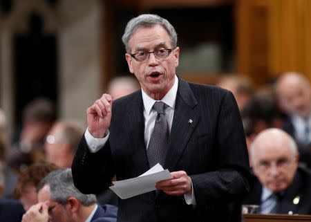 Canada's Finance Minister Joe Oliver speaks during Question Period in the House of Commons on Parliament Hill in Ottawa October 29, 2014. REUTERS/Chris Wattie