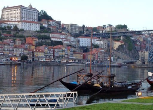 Historical wine transportion boats are moored at the Vila Nova de Gaia Port district of Porto. Portugal's Douro Valley is opening up its quintas, or port wine estates, to upscale tourists who are throwing it a lifeline in a bad economy