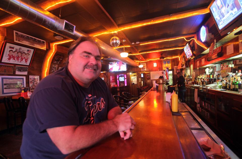 Tommy Burelle, of Ferndale, the owner of Tommy's Detroit Bar & Grill located at 624 3rd St. in downtown Detroit, leans on his bar Friday, Oct. 5, 2012.