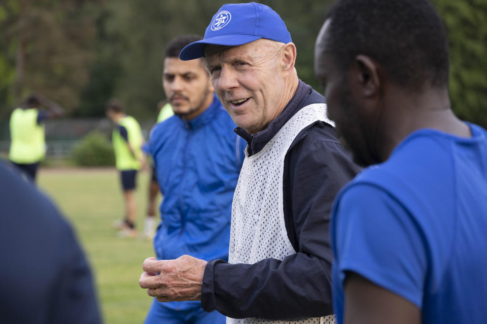 Makkabi Berlin coach Wolfgang Sandhowe gives instructions to his team during training in Berlin, Germany, Tuesday, May 21, 2024. Makkabi became the first Jewish club to play in the German Cup and it's bidding to reach the competition again on Saturday, May 25, when it plays Victoria Berlin in the Berlin Cup final. (AP Photo/Ciaran Fahey)