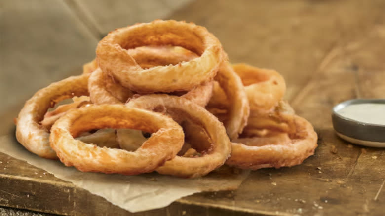 Smashburger onion rings on table