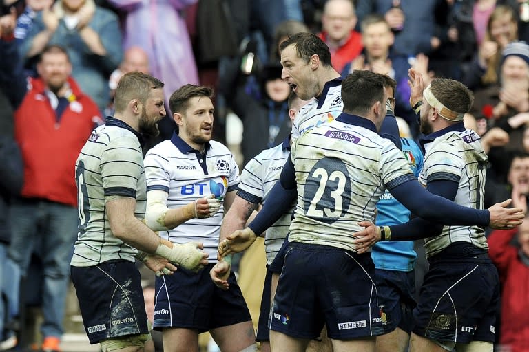 Scotland's Tim Visser (C) celebrates scoring his try during the Six Nations international against Italy at Murrayfield