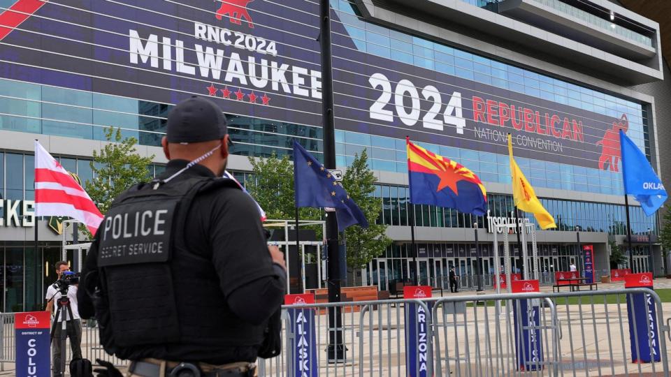 PHOTO: A police officer stands guard as preparations for the Republican National Convention are underway in Milwaukee, Wis., July 14, 2024.  (Brian Snyder/Reuters)