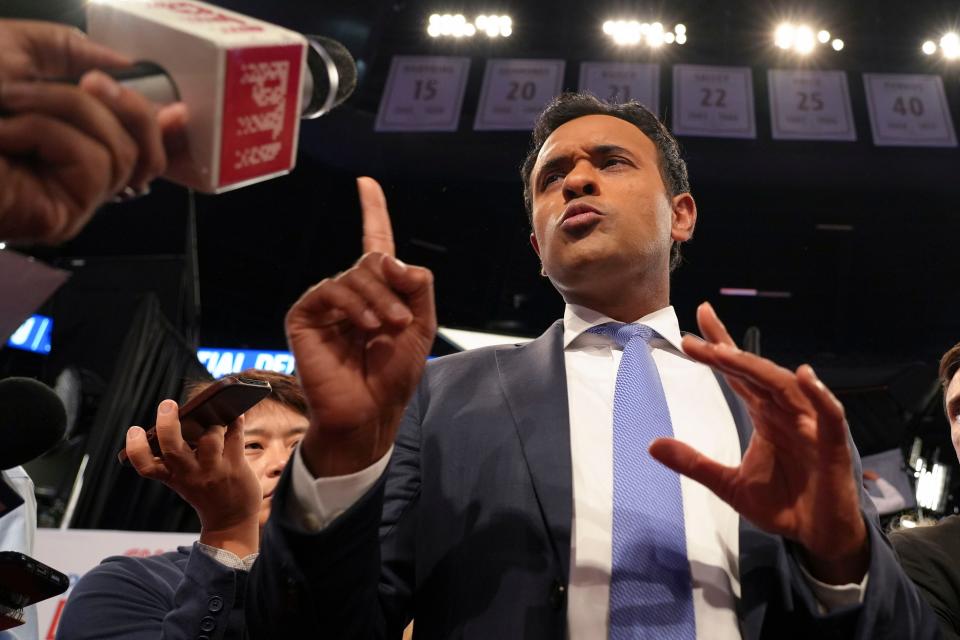 Vivek Ramaswamy speaks with reporters before a debate between President Joe Biden and former President Donald Trump last month.