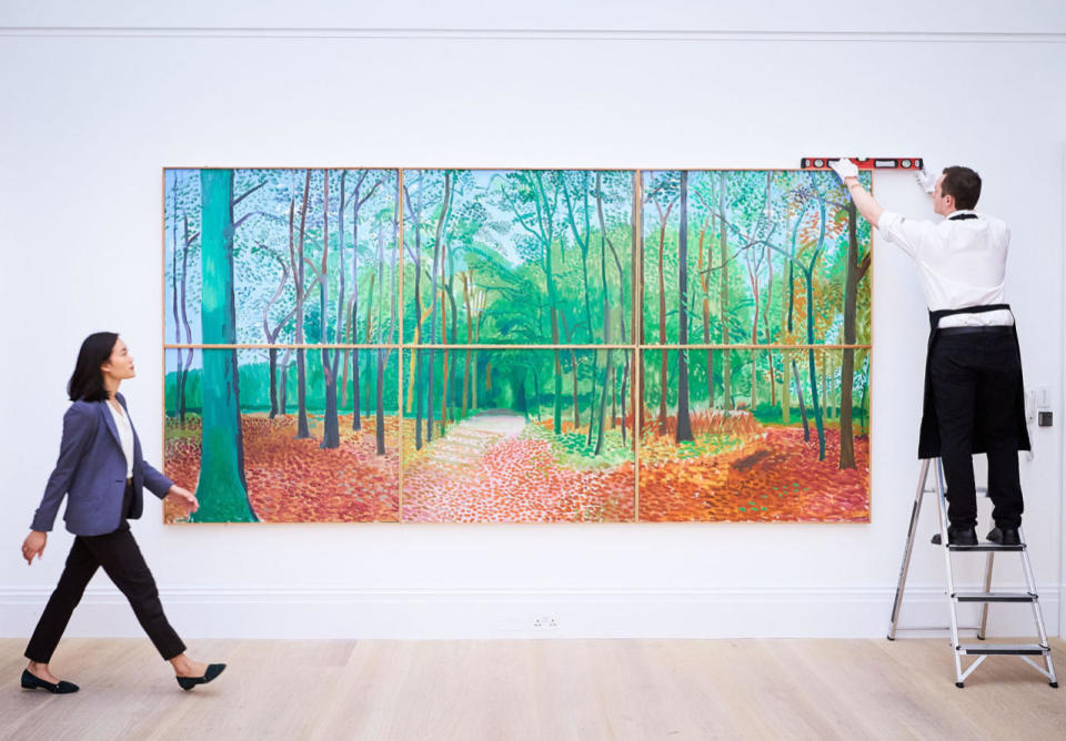 <p>A monumental masterpiece, ‘Woldgate Woods, 24, 25 and 26, 2016, by the British Artist David Hockney is unveiled at Sotheby’s on Sept. 30, 2016 in London, England. Estimated at $9-12m, the painting is set to break the auction record for Hockney when offered at Sotheby’s New York on Nov. 17, 2016. (Photo: Michael Bowles/Getty Images/Sotheby’s)</p>