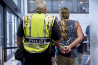 <p>Capitol Hill police officers arrest a group protesting the Republican healthcare bill outside the offices of Sen. Lisa Murkowski, R-Alaska, on Capitol Hill in Washington, Monday, July 17, 2017. (Photo: Andrew Harnik/AP) </p>