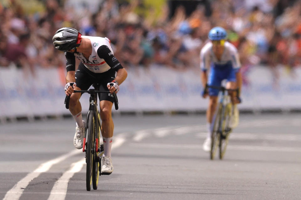 UAE Team Emirates British rider Adam Yates L looks back as he cycles to the finish line to win ahead of his brother Team Jayco Alulas British rider Simon Yates placing second during the 1st stage of the 110th edition of the Tour de France cycling race 182 km departing and finishing in Bilbao in northern Spain on July 1 2023 Photo by Thomas SAMSON  AFP Photo by THOMAS SAMSONAFP via Getty Images