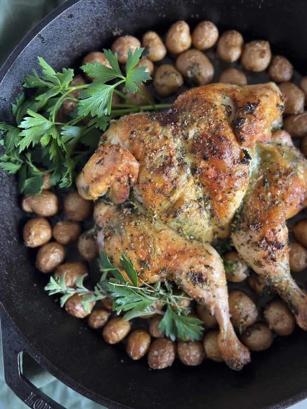 <p>Big Delicious Life</p><p>Tender and juicy garlic herb spatchcock chicken with crispy baby potatoes is the perfect one-pan meal to feed the whole family.</p><p><strong>Get the recipe: <a href="https://bigdeliciouslife.com/spatchcock-garlic-herb-roast-chicken-with-baby-potatoes/" rel="nofollow noopener" target="_blank" data-ylk="slk:Spatchcock Roast Chicken and Potatoes;elm:context_link;itc:0;sec:content-canvas" class="link ">Spatchcock Roast Chicken and Potatoes</a></strong></p>