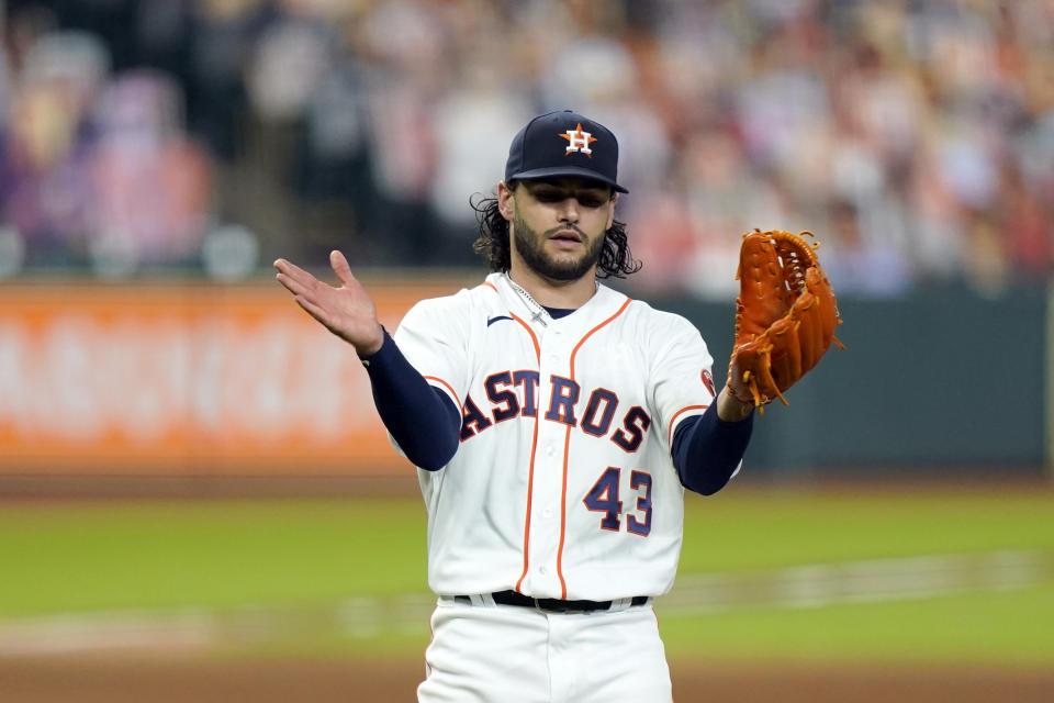 Houston Astros starting pitcher Lance McCullers Jr. reacts after getting Texas Rangers' Willie Calhoun to pop out during the sixth inning of a baseball game Wednesday, Sept. 16, 2020, in Houston. (AP Photo/David J. Phillip)