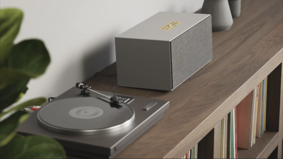 Audio Pro C20 next to a turntable in a lounge room