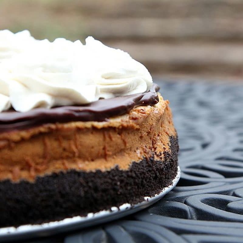 <p>Jenni Field's Pastry Chef Online</p><p>A simple Oreo crust holds creamy, smooth, luscious Biscoff cheesecake topped with a Biscoff ganache and brown sugar whipped cream.</p><p><strong>Get the recipe: <a href="https://pastrychefonline.com/biscoff-cookie-butter-cheesecake-with-biscoff-ganache/" rel="nofollow noopener" target="_blank" data-ylk="slk:Biscoff Cookie Butter Cheesecake with Biscoff Ganache;elm:context_link;itc:0;sec:content-canvas" class="link ">Biscoff Cookie Butter Cheesecake with Biscoff Ganache</a></strong></p>