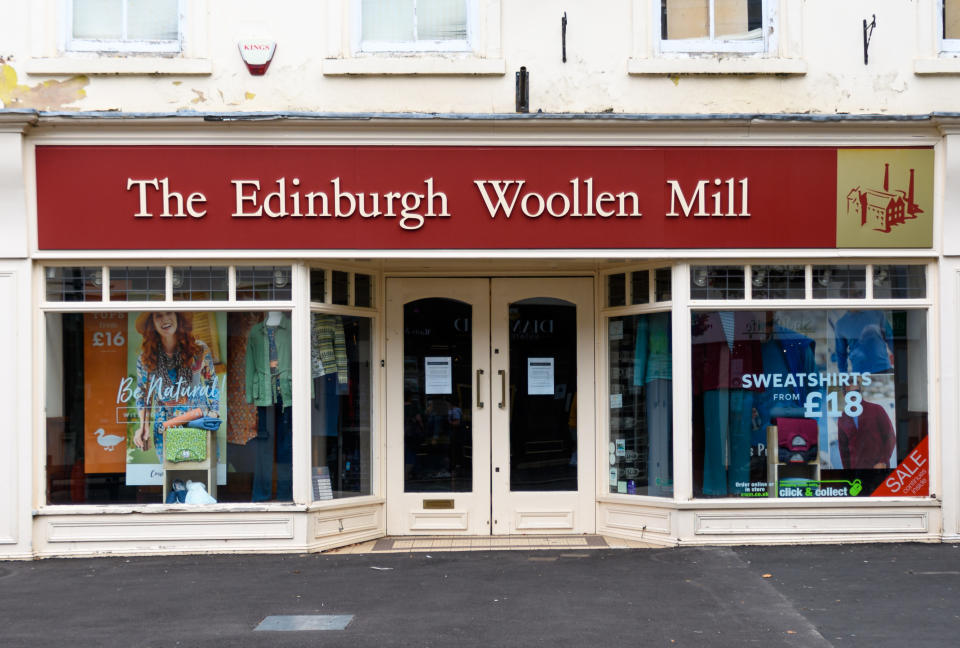 Tiverton, United Kingdom - August 17 2020:  The frontage of Edinburgh Woollen Mill  clothes shop on Fore Street