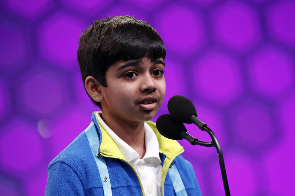 FILE -Akash Vukoti, 9, of San Angelo, Texas, competes in the second round of the Scripps National Spelling Bee, Tuesday, May 28, 2019, in Oxon Hill, Md. The Scripps National Spelling Bee is back, fully in person at its usual venue outside Washington for the first time since 2019. But the pandemic continues to affect kids who've spent years preparing to compete for spelling's top prize. (AP Photo/Patrick Semansky, File)