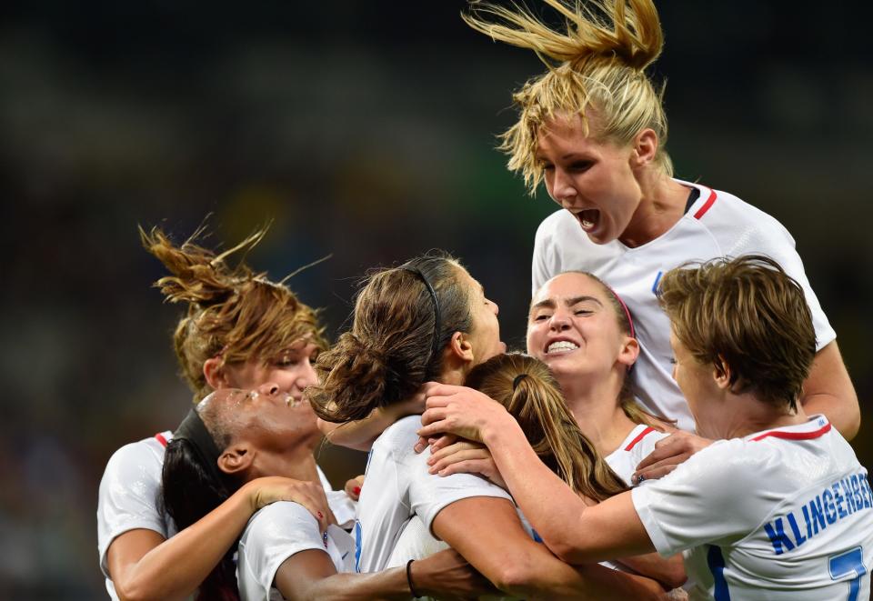 <p>Carli Lloyd of United States celebrates with her team after scoring during the Women’s Group G first round match between United States and France during Day 1 of the Rio 2016 Olympic Games at Mineirao Stadium on August 6, 2016 in Belo Horizonte, Brazil. (Photo by Pedro Vilela/Getty Images) </p>