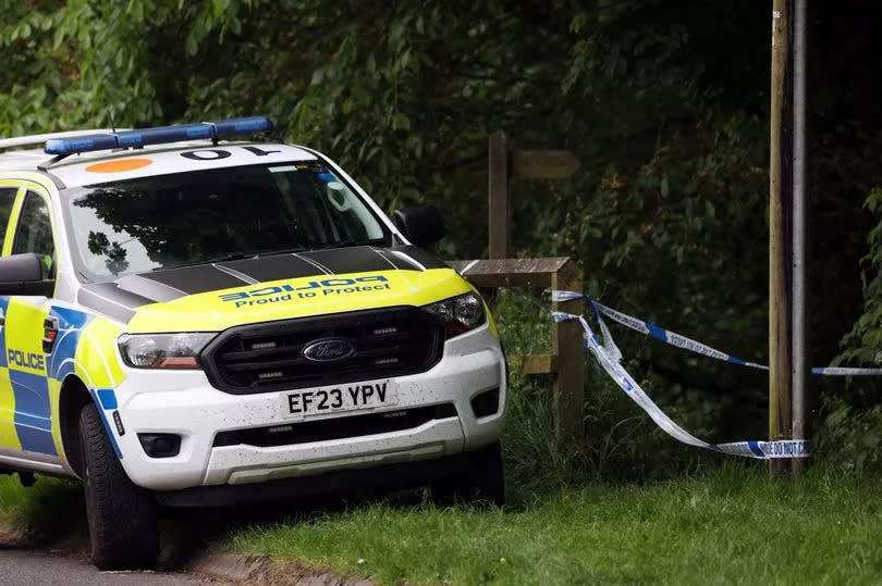 Police cordon in place on main road Ovingham, Northumberland, at a public footpath leading down to the river