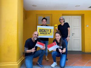 Dickey's Owner/Operators From Left to Right, Mavin Singh, Ang (Ding) Yen, Jasmin Kaur, and in front, 
Geraldine Ng